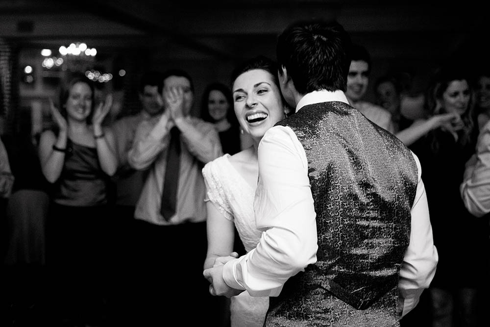 A documentary photograph of a couple dancing during their Boston wedding