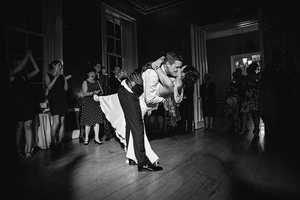 A documentary photograph of a bride and groom sharing their first dance during a Boston wedding