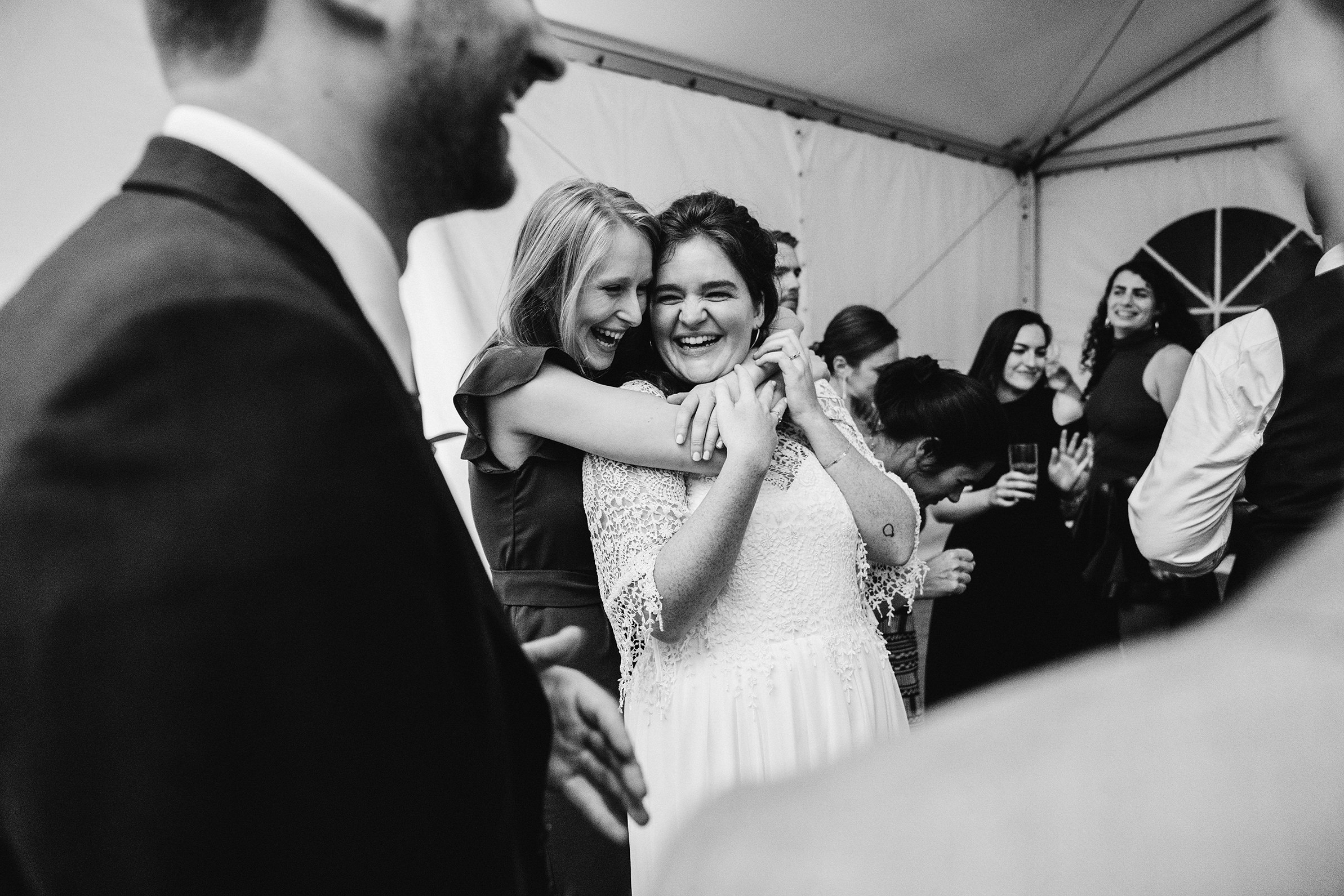 A documentary photograph featured in the best of wedding photography of 2019 showing a bride dancing with her friends